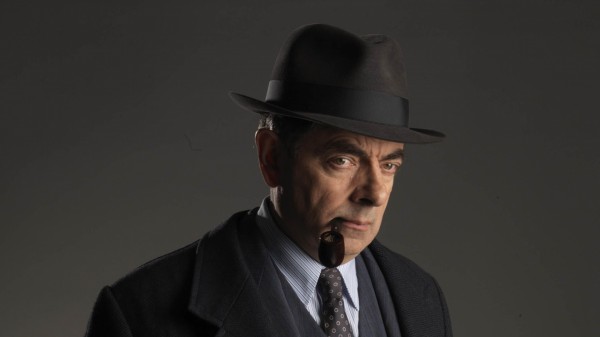 Rowan Atkinson as Maigret