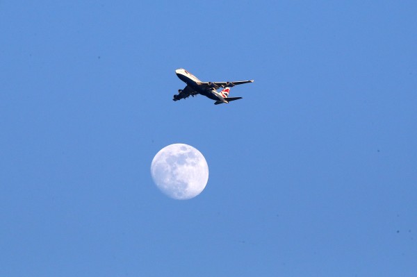 A British Airways plane flies over head