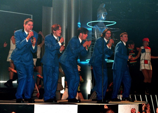 Pop Group 'Take That' perform on stage at the Brit Awards after collecting the Best Single by a British Act and Best Video Awards