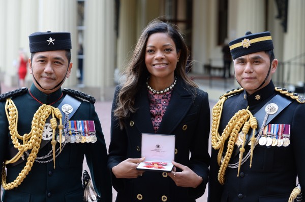 James Bond star Naomie Harris at Buckingham Palace, London, after receiving her OBE medal from Queen Elizabeth II. (John Stillwell/PA Wire/PA Images)
