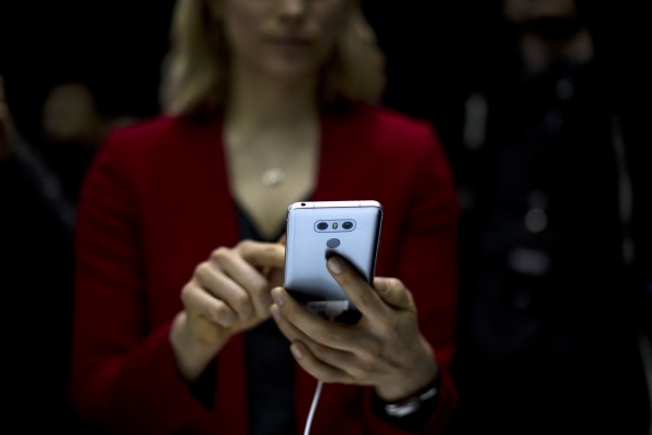 A woman holds the new G6