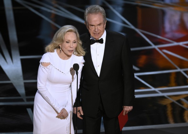 Faye Dunaway, left, and Warren Beatty present the award for best picture at the Oscars 
