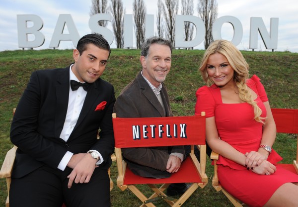 Netflix co-founder Reed Hastings (centre) with James "Arg" Argent and Sam Faiers from The Only Way Is Essex at the launch of Netflix in the UK in 2012