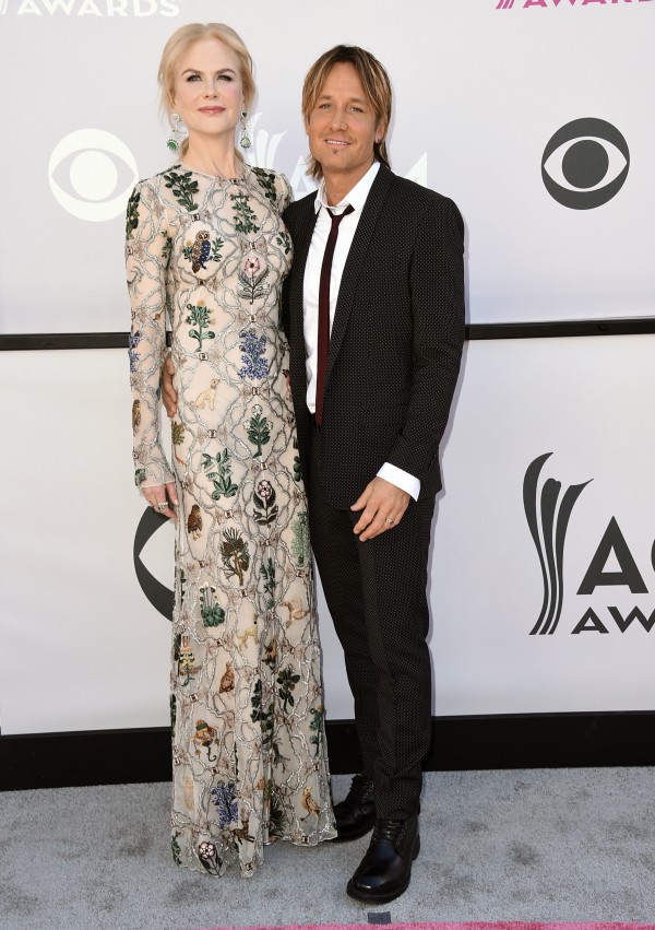 Nicole Kidman, left, and Keith Urban arrive at the awards (Jordan Strauss/Invision/AP)