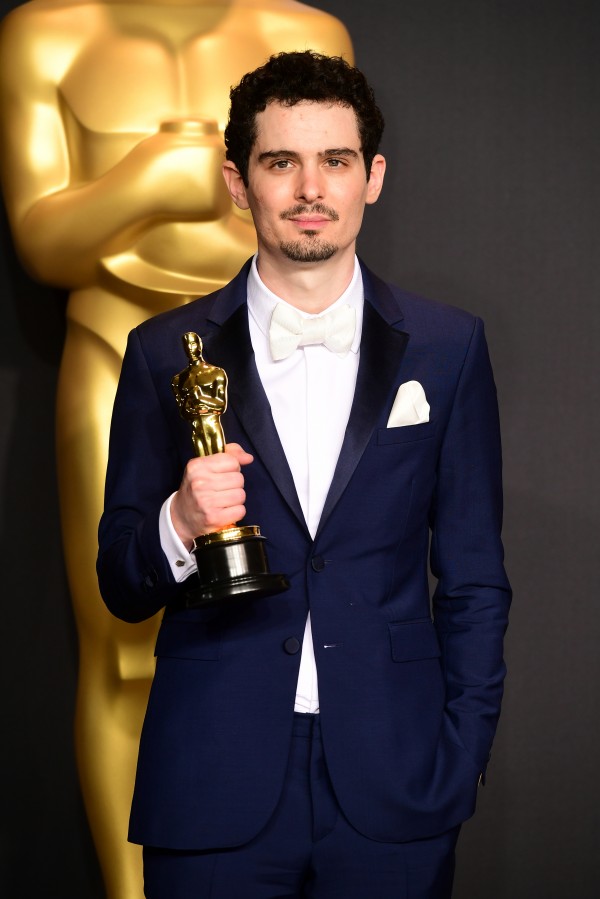 Damien Chazelle with his Oscar