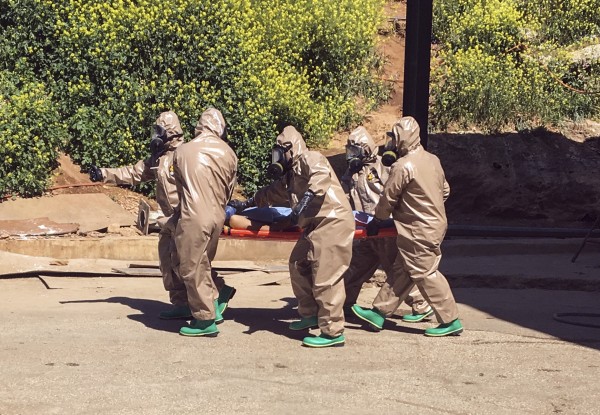 A victim of the chemical attack is carried