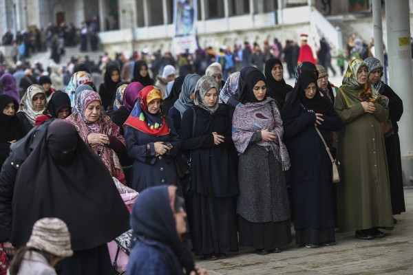 Women mourn victims