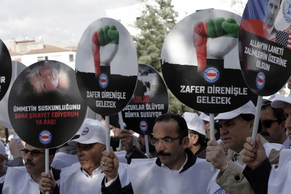 Men holding protest banners
