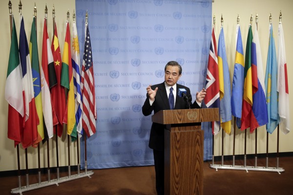 China's Foreign Minister Wang Yi delivers his remarks outside the Security Council at United Nations headquarters, Friday, April 28, 2017. 
