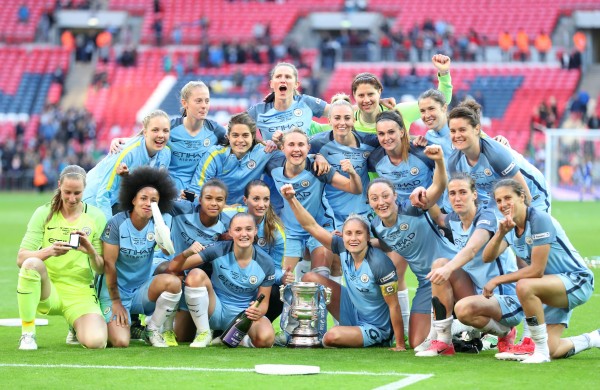 City's women with the cup