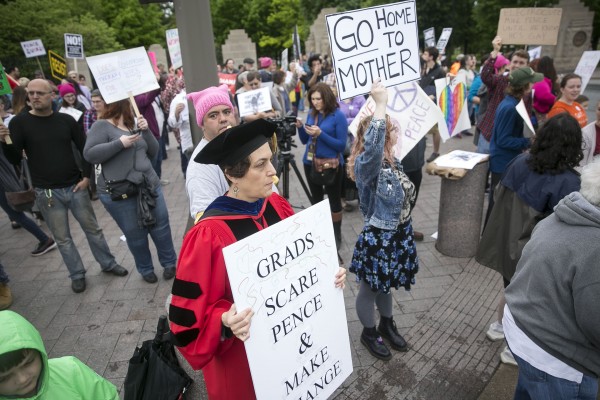 Protesters congregat outside the University's main gate