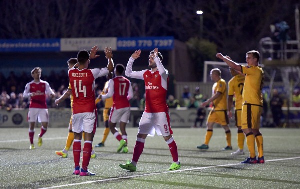 Arsenal's Theo Walcott (left) and celebrates scoring his side's second goal of the game with Lucas Perez