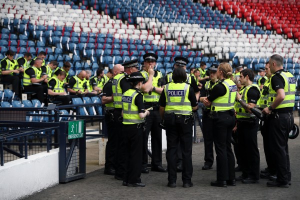 Police are briefed inside the stadium in Glasgow.