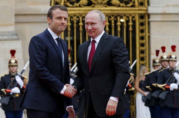 Macron handshake