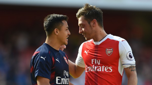 Arsenal's Alexis Sanchez (left) and Mesut Ozil at full time