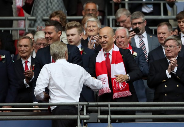 Arsenal manager Arsene Wenger shakes hands with Arsenal Chief Executive Ivan Gazidis