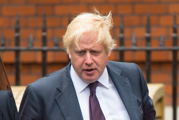 Boris Johnson leaving his ministerial residence (Dominic Lipinski/PA)