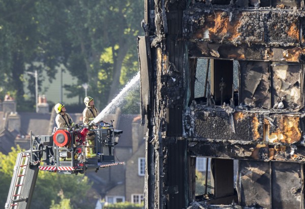 Water is sprayed on Grenfell Tower (Rick Findler/PA)