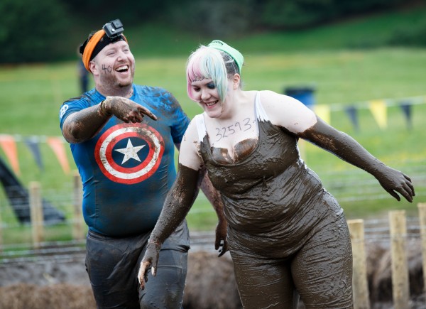 Participants take part in a Tough Mudder event race at Drumlanrig Castle