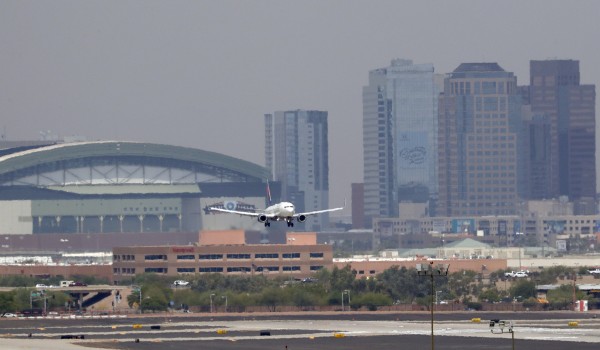 Heat waves ripple across the tarmac at Sky Harbor International Airport in Phoenix (Matt York/AP)