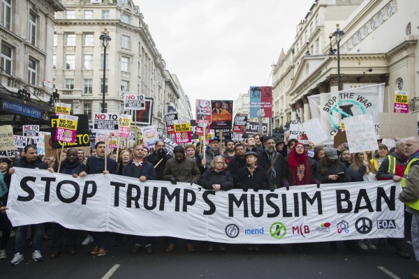 Demonstrators march to Downing Street, as they protest against US President Donald Trump's travel ban.