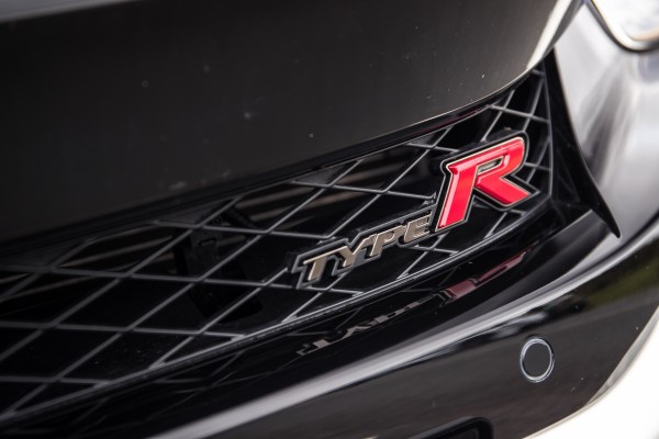 A variety of Type R badges are dotted across the car's exterior