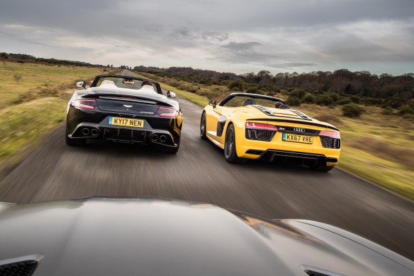 The Aston and Mercedes battle it out